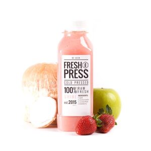 Cold-pressed juice Shine with fresh apple, coconut, and strawberry
